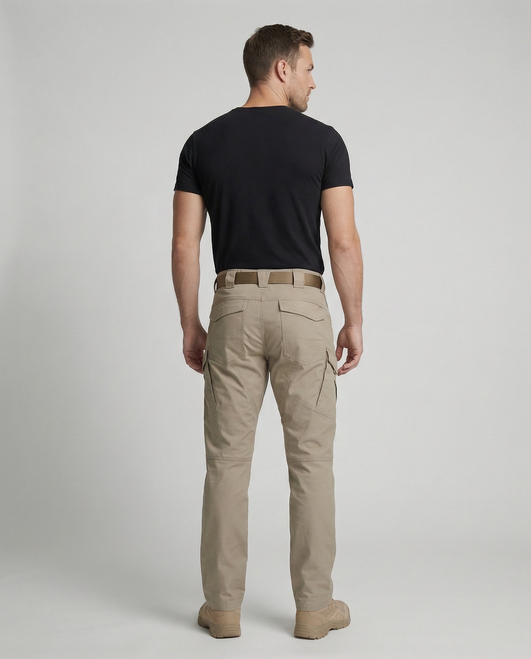 Men’s outdoor pants in khaki with weather-resistant fabric, ergonomic design, and elastic cuffs for trekking, hiking, and climbing.