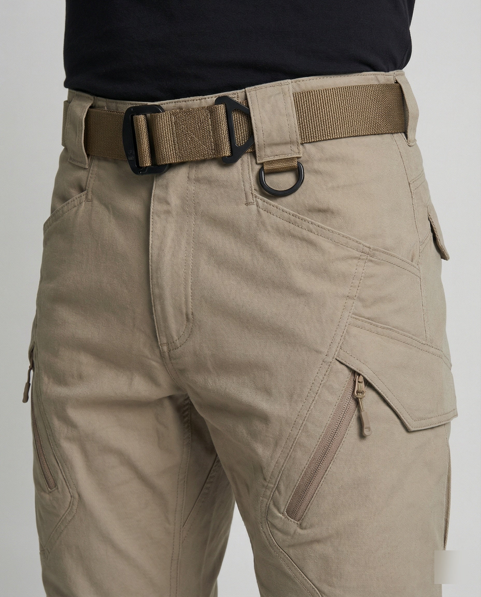 Men’s outdoor pants in khaki with weather-resistant fabric, ergonomic design, and elastic cuffs for trekking, hiking, and climbing.