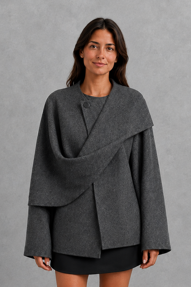 Women’s Lucille longline cape coat with an elegant relaxed silhouette and built-in scarf for cosy autumn and winter layering.