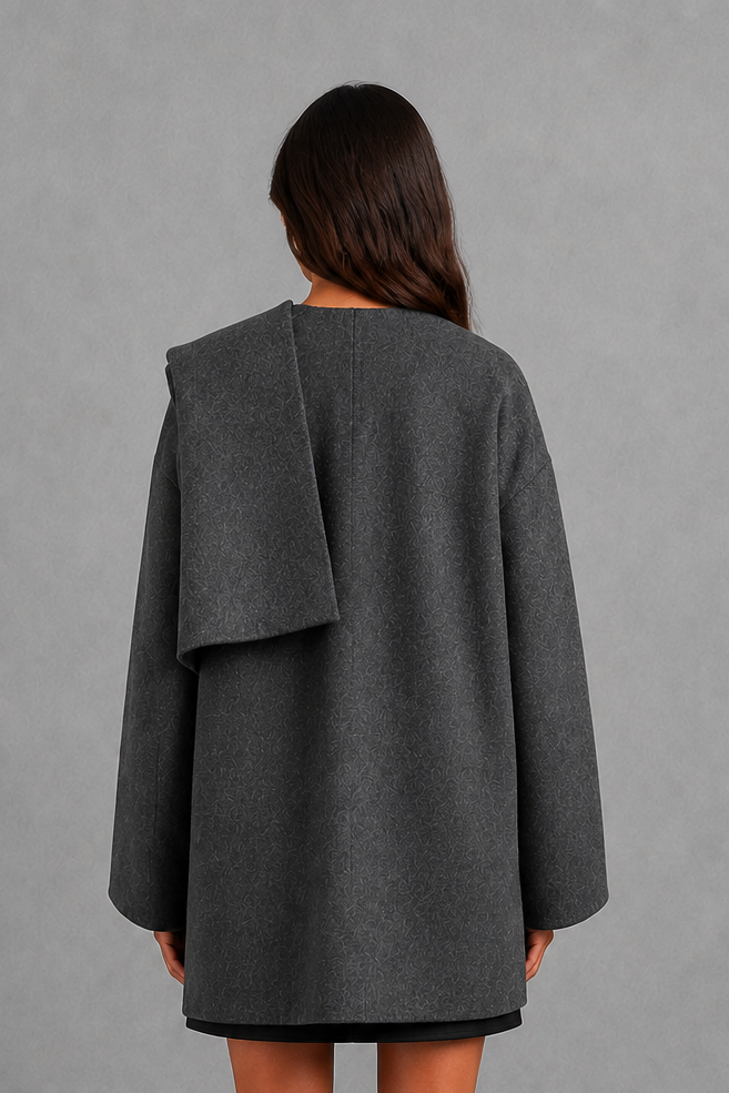 Women’s Lucille longline cape coat with an elegant relaxed silhouette and built-in scarf for cosy autumn and winter layering.