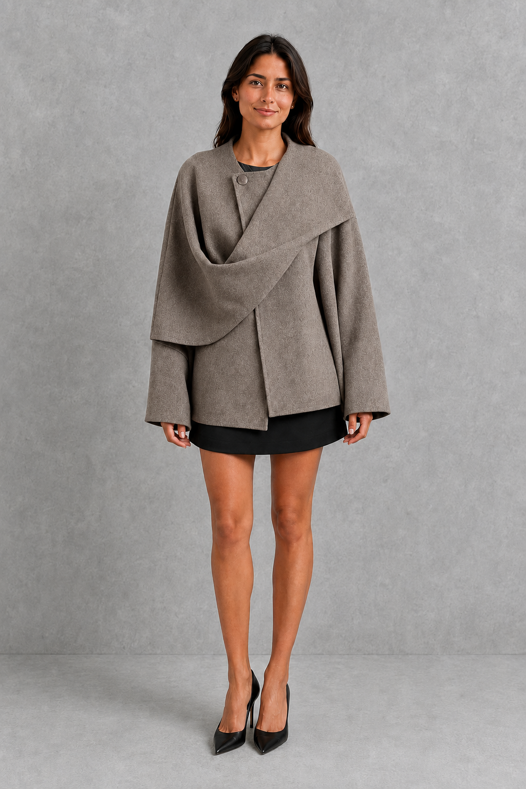 Women’s Lucille longline cape coat with an elegant relaxed silhouette and built-in scarf for cosy autumn and winter layering.