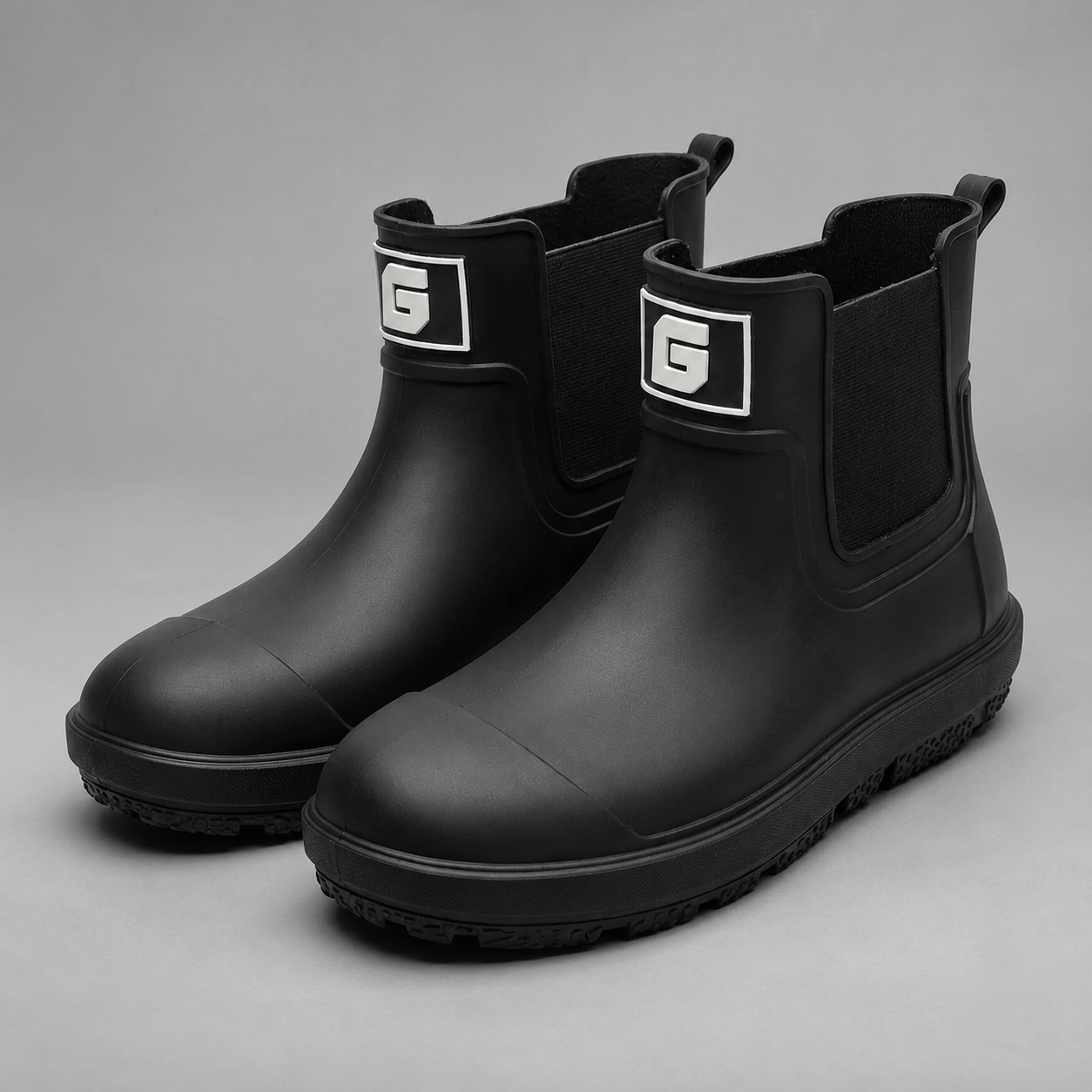 Women's waterproof ankle boots with a non-slip sole and easy pull-on design for comfortable everyday wear in wet weather.