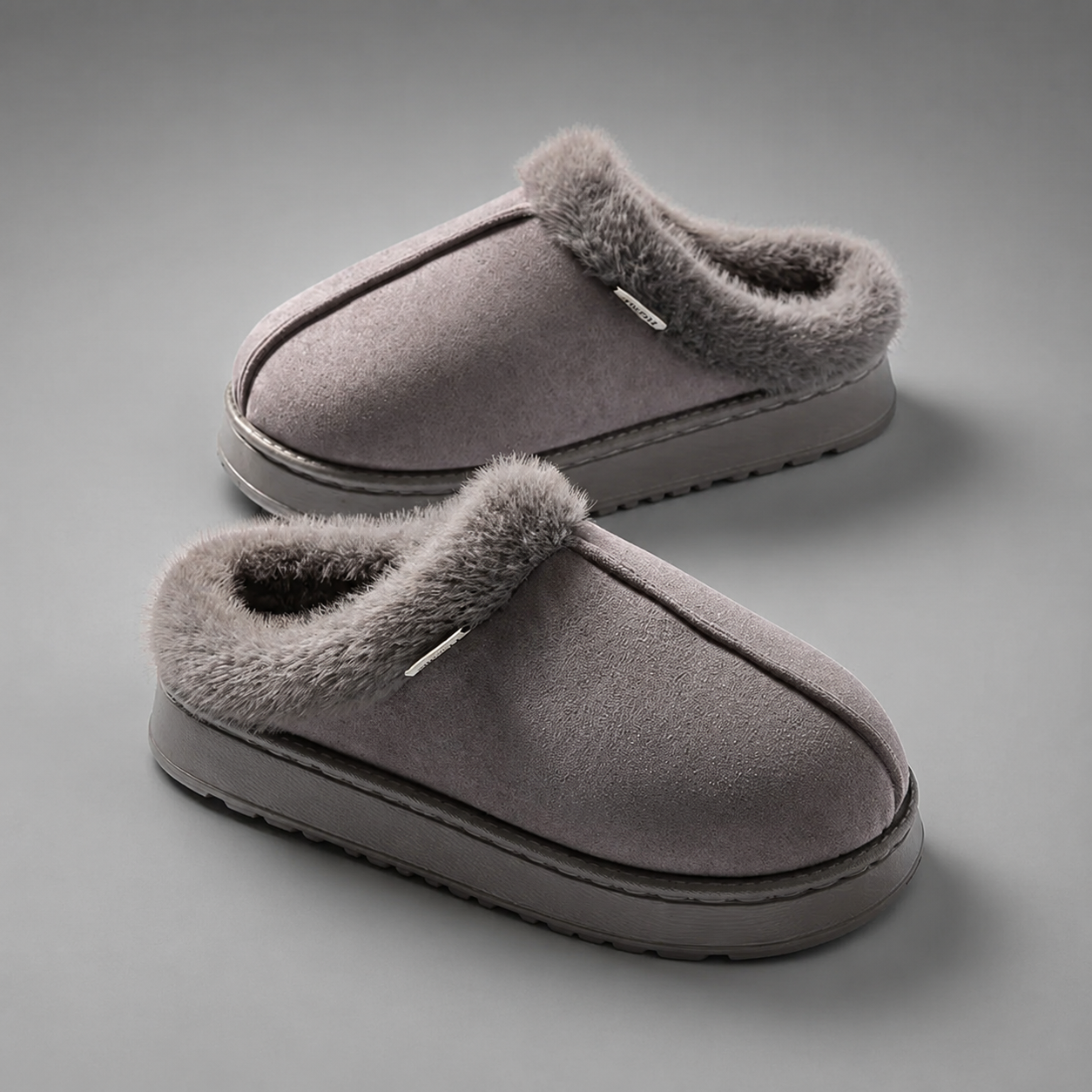 Women's fluffy winter slippers with a plush faux suede upper, soft fleece lining, thick non-slip EVA sole and slip-on design, providing warm, lightweight comfort for indoor wear during autumn and winter.