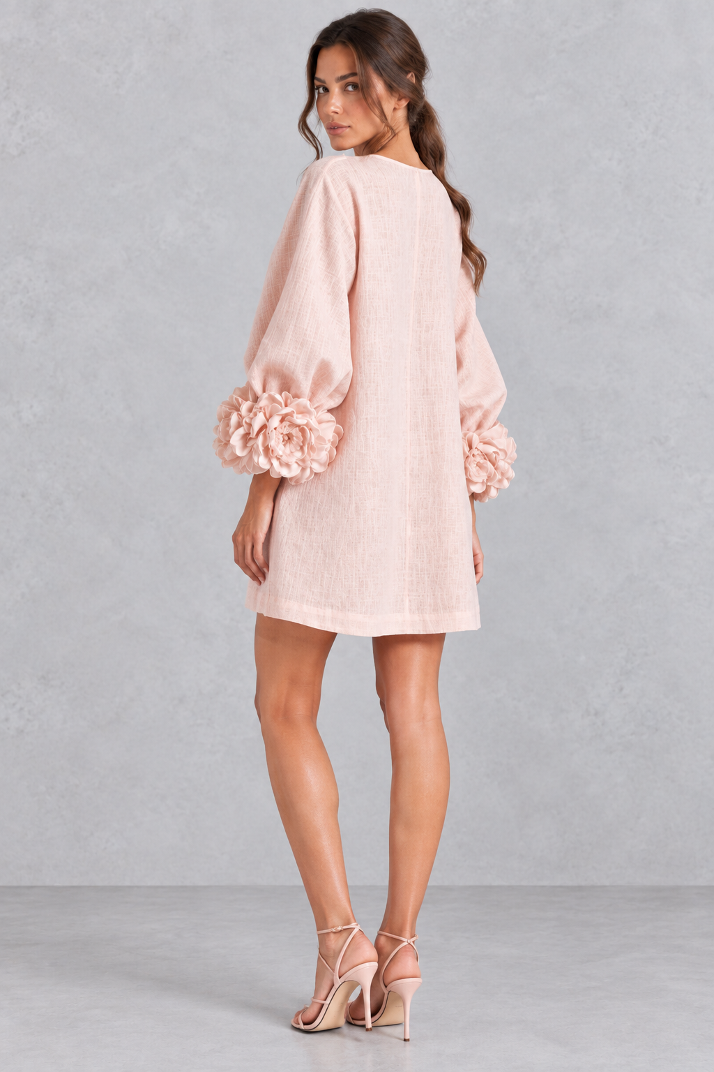 Women’s cotton-linen mini dress with 3D floral detailing, round neckline, long lantern sleeves and a loose A-line silhouette.