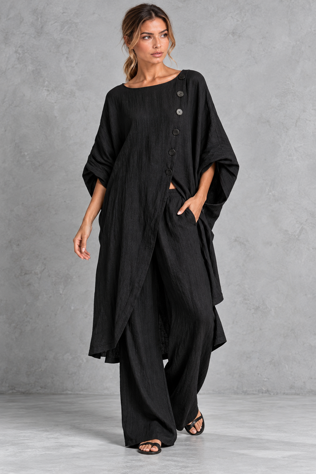 Women's black batwing sleeve tunic and wide leg trouser set – front view