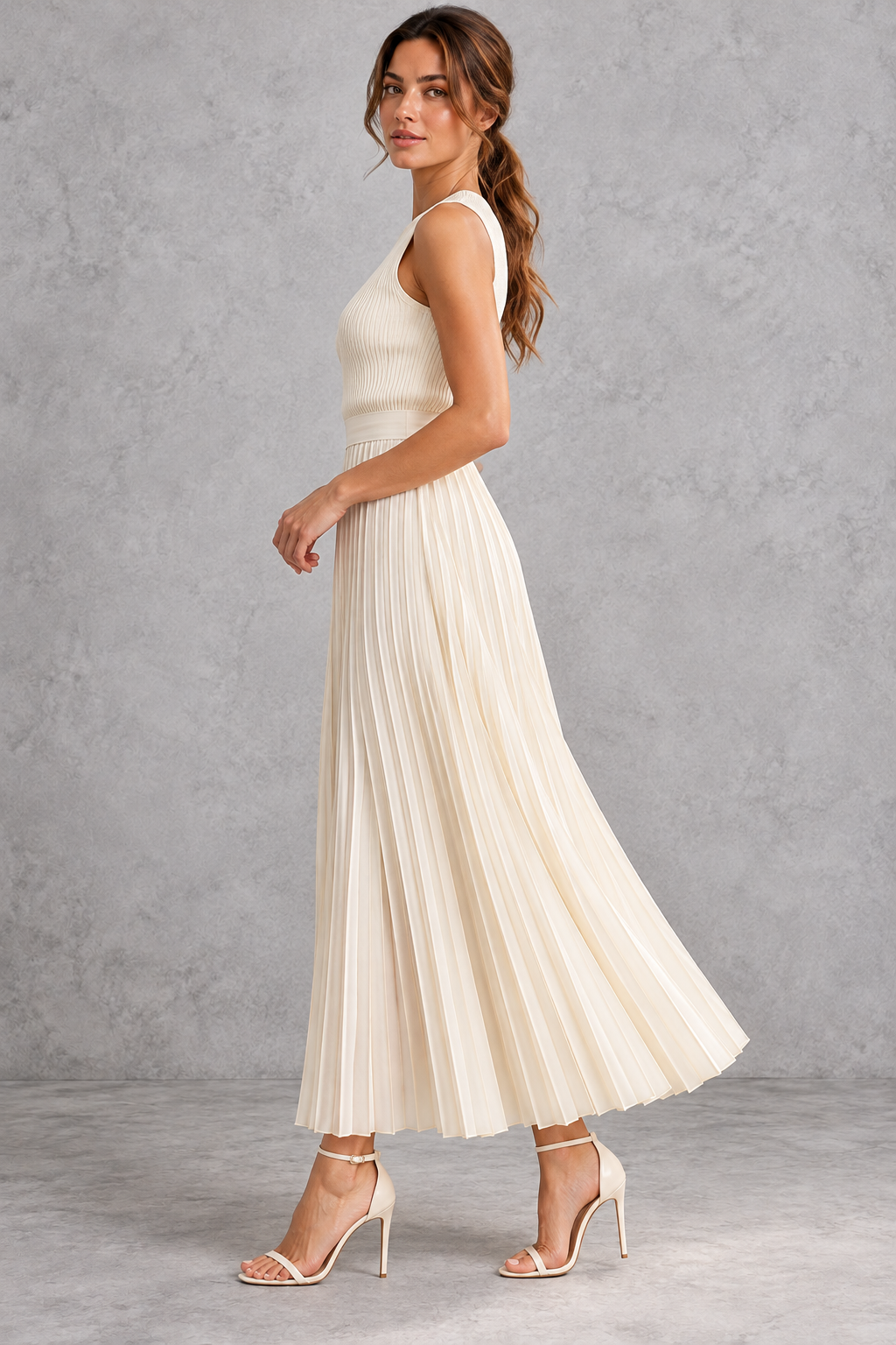 Women's cream sleeveless ribbed top and pleated maxi skirt set – side view