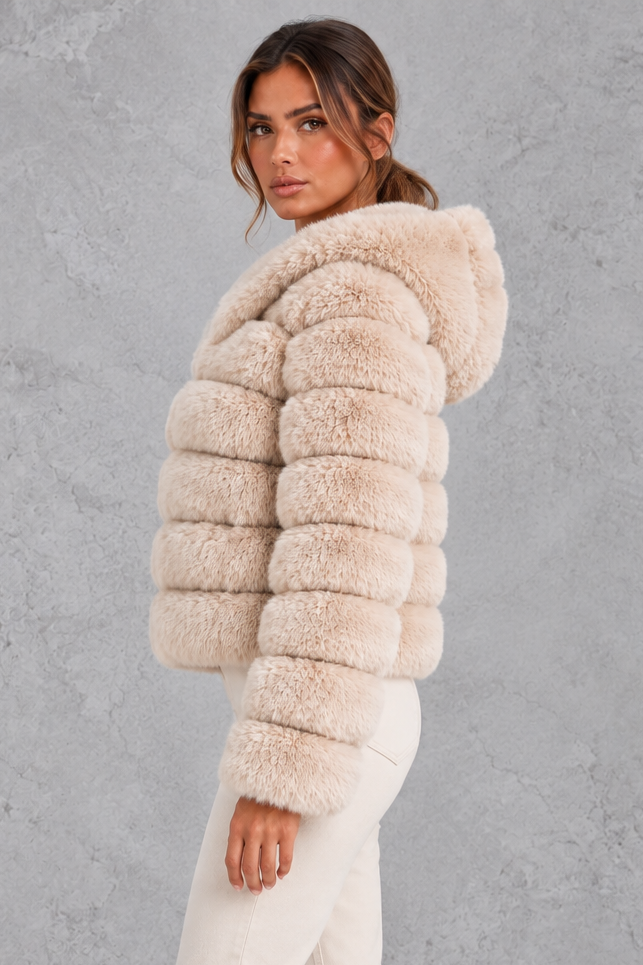 Women’s cropped faux fur winter jacket with a plush hood, horizontal panelled detailing, long sleeves and a voluminous silhouette.