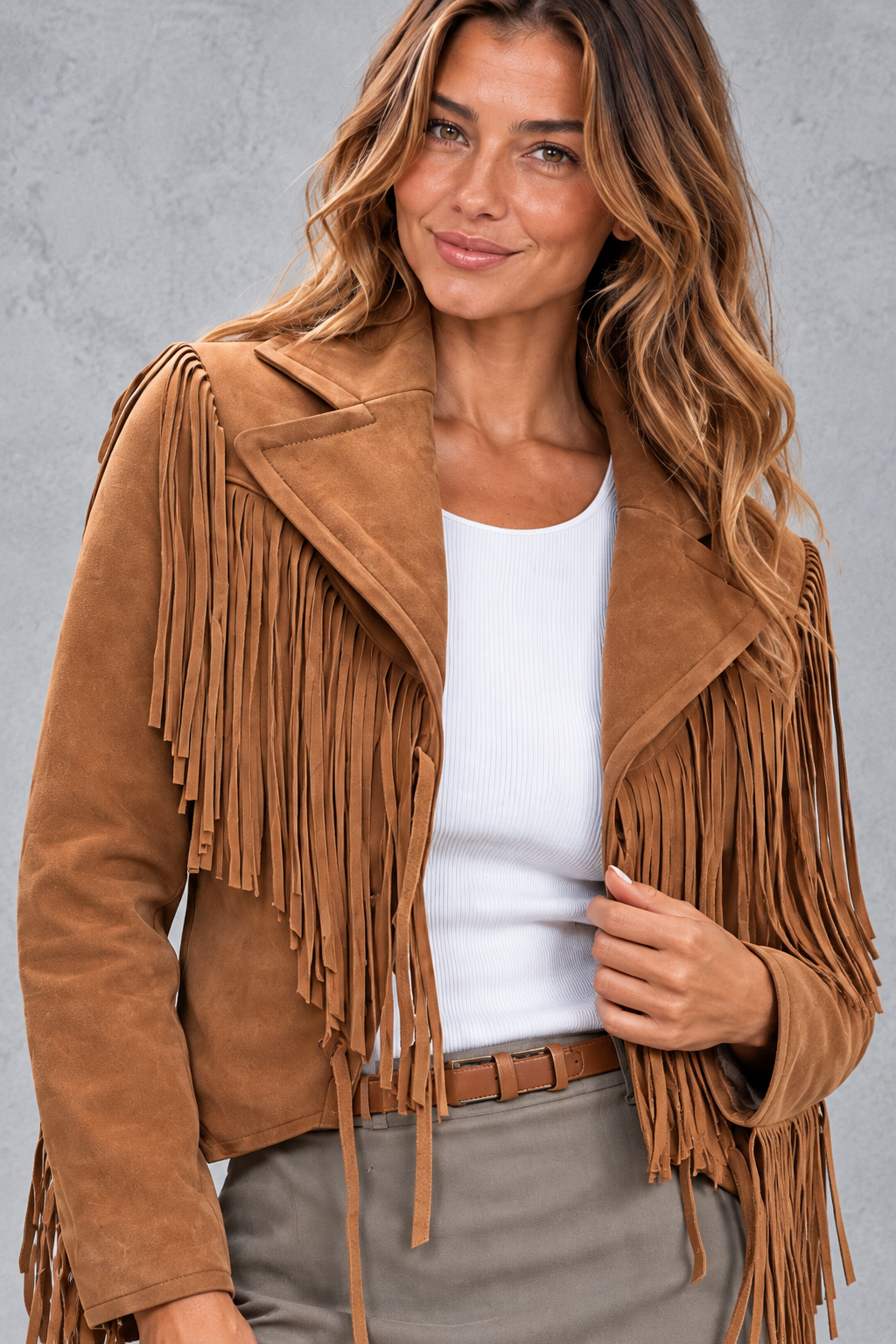 Women's cropped faux suede fringe jacket in Brown – close-up