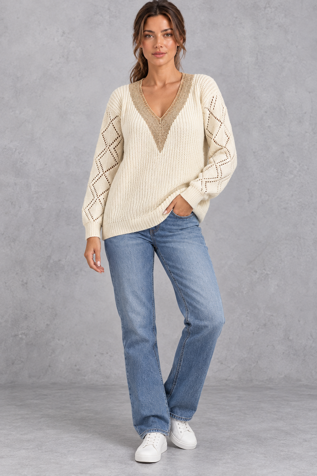Women's deep V-neck knitted jumper in Cream – full-length view