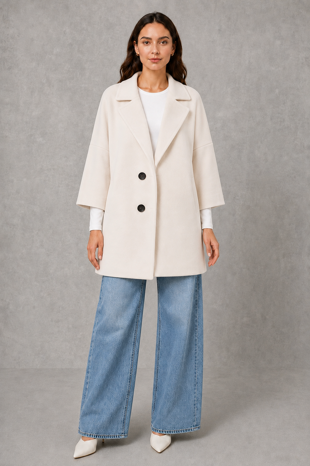Women’s elegant longline coat with a classic tailored silhouette and lightweight finish, ideal for polished spring and autumn layering.