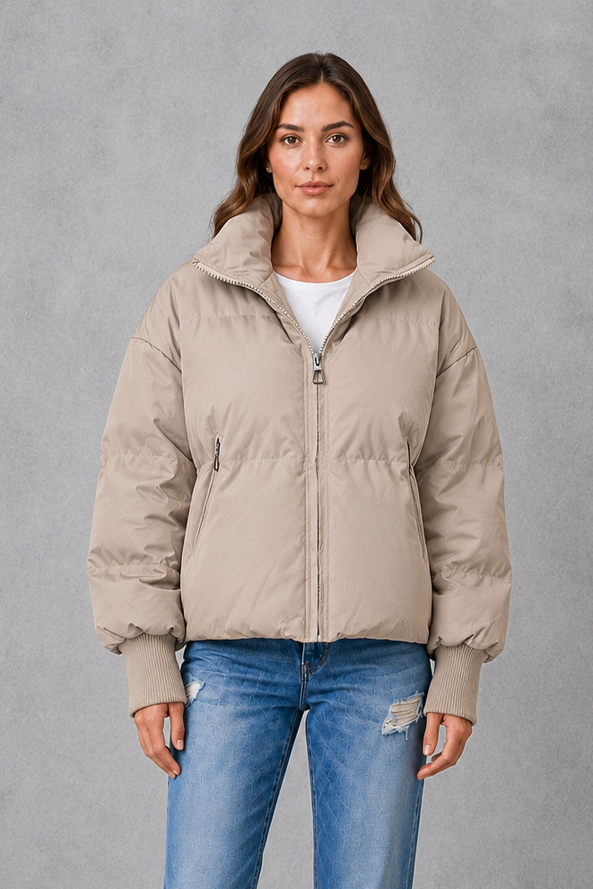 Women’s high collar quilted puffer jacket with lightweight padding, full zip fastening and practical side pockets for everyday winter wear.