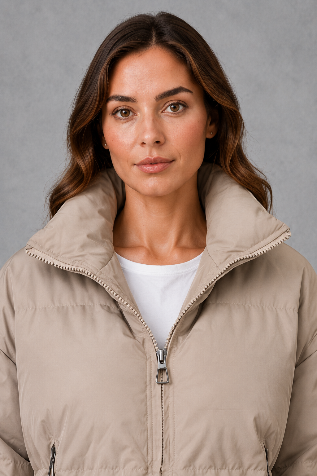 Women’s high collar quilted puffer jacket with lightweight padding, full zip fastening and practical side pockets for everyday winter wear.