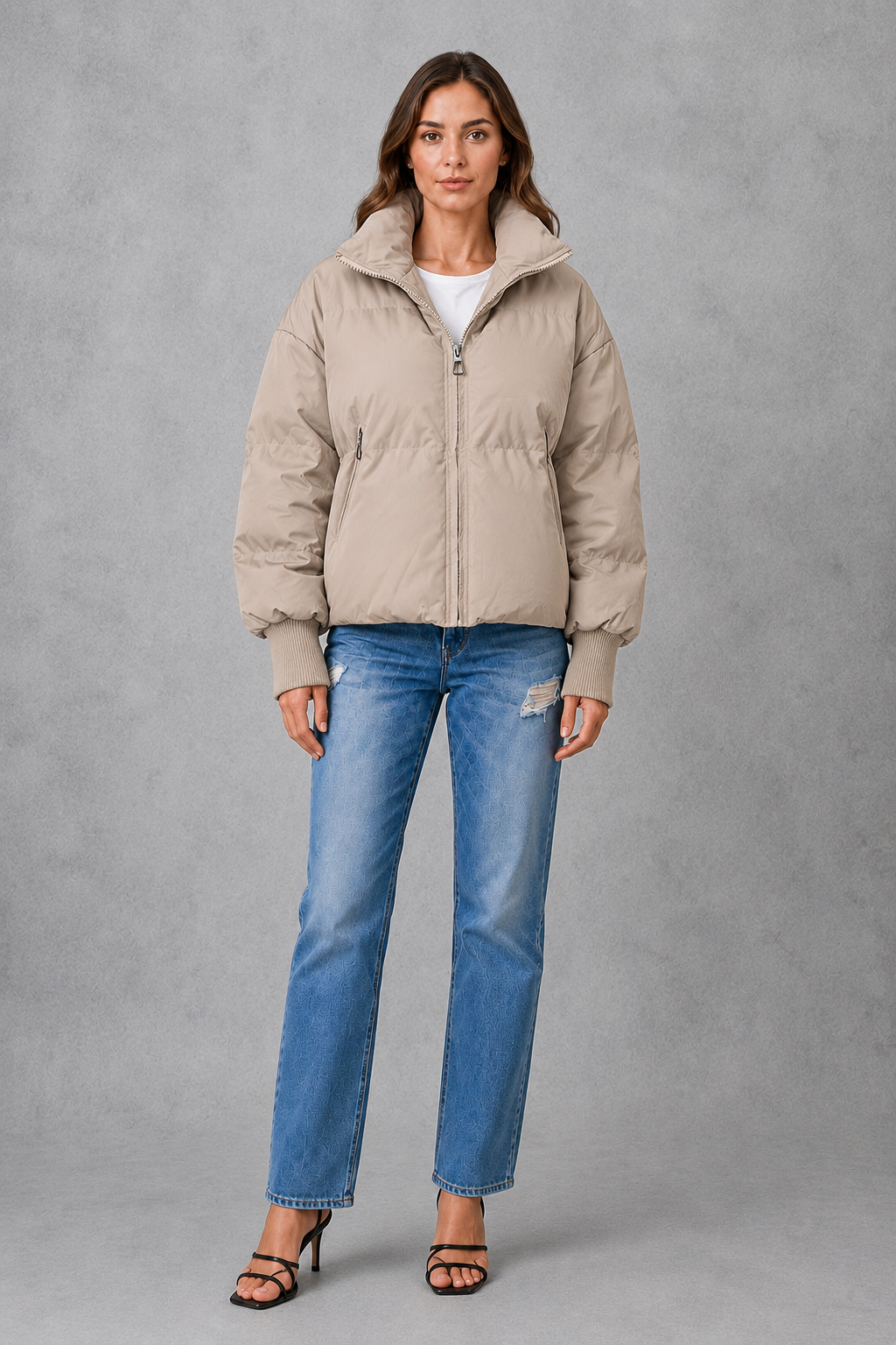 Women’s high collar quilted puffer jacket with lightweight padding, full zip fastening and practical side pockets for everyday winter wear.