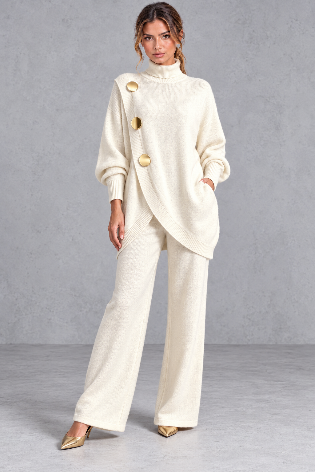 Women's cream knitted turtleneck jumper and wide leg trouser set with gold buttons – front view