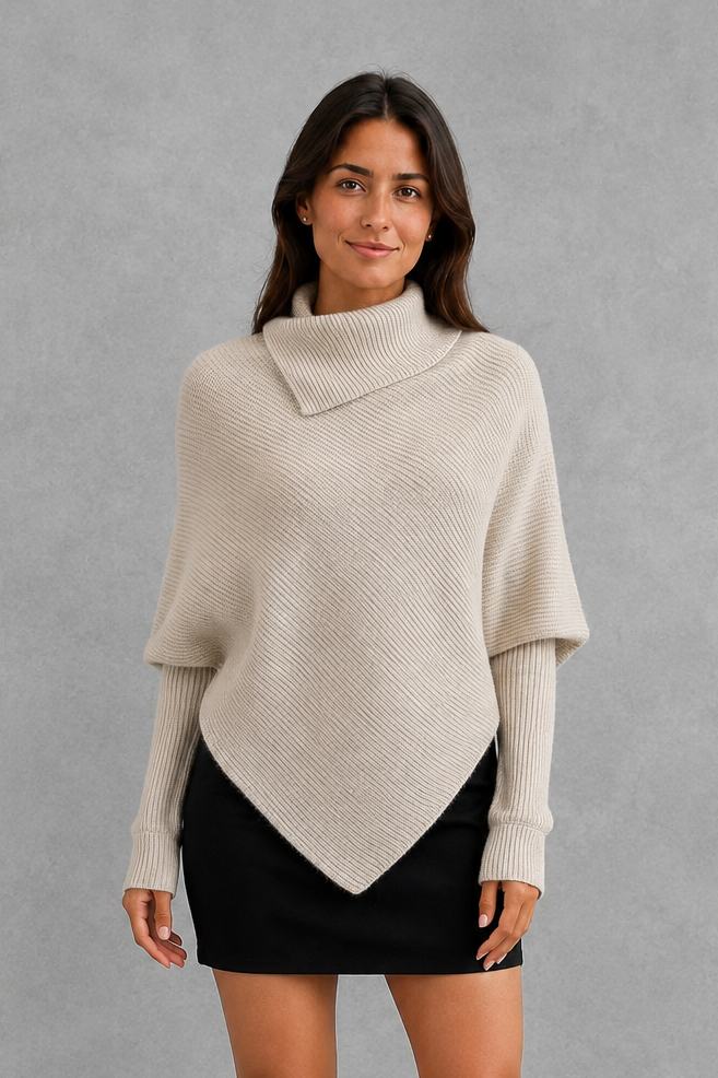 Women’s high neck knit jumper with oversized batwing sleeves, rib-knit texture and an asymmetric split hem.