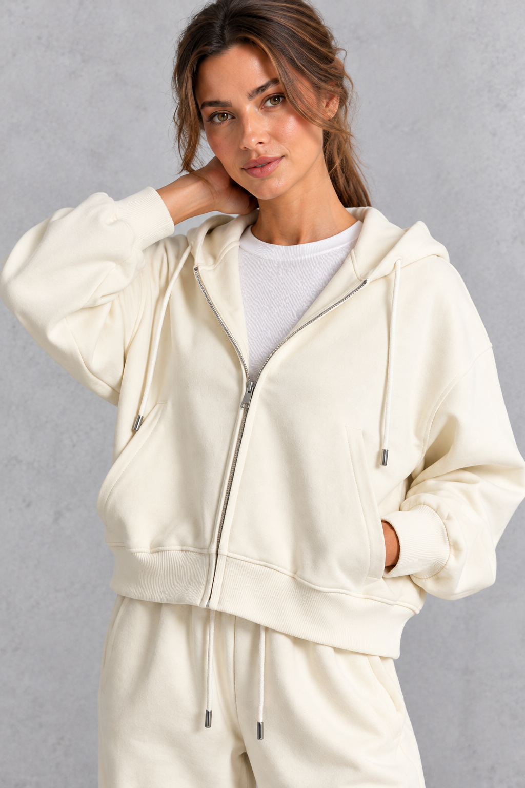 Women's cream zip-up hoodie – close-up of zip and drawstring hood