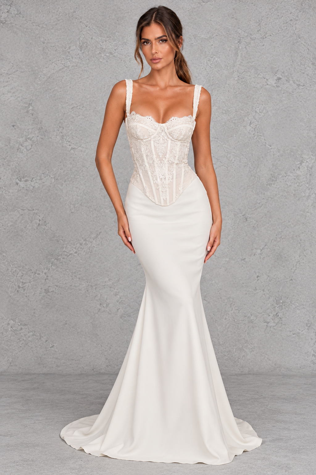 Women’s ivory lace bridal corset with lightly padded underwired cups, adjustable straps, internal boning and a romantic lace-up back.