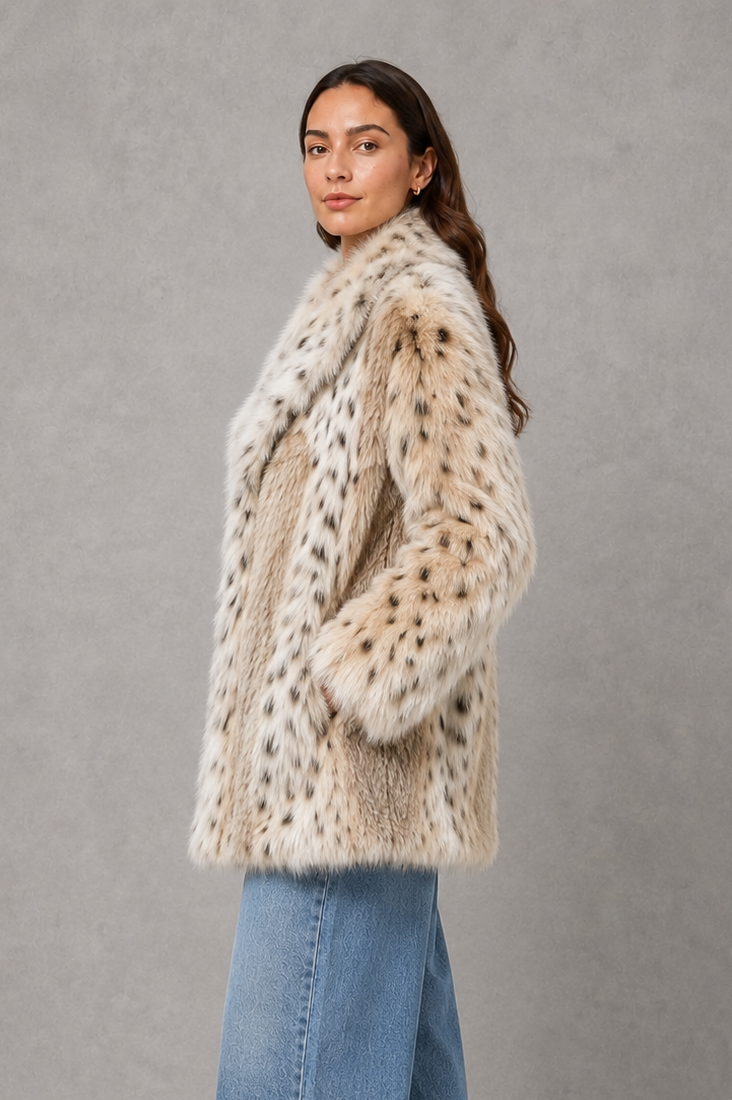 Women’s leopard print faux fur jacket with a soft plush texture, relaxed oversized silhouette and deep side pockets for statement winter styling.