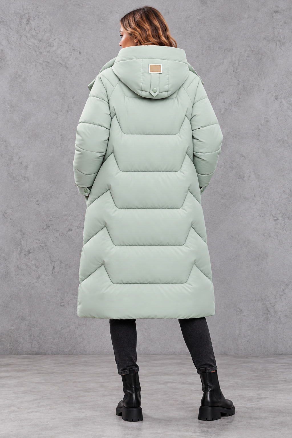Women's long hooded puffer coat in Mint Green – back view