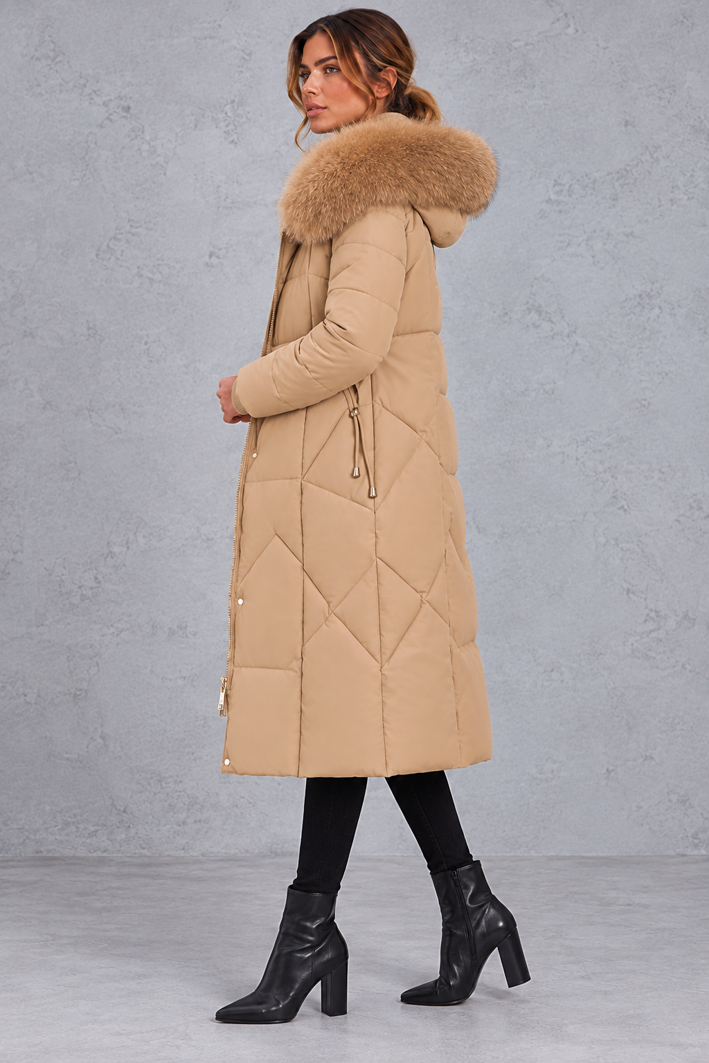 Women's longline quilted puffer coat in Camel – side view