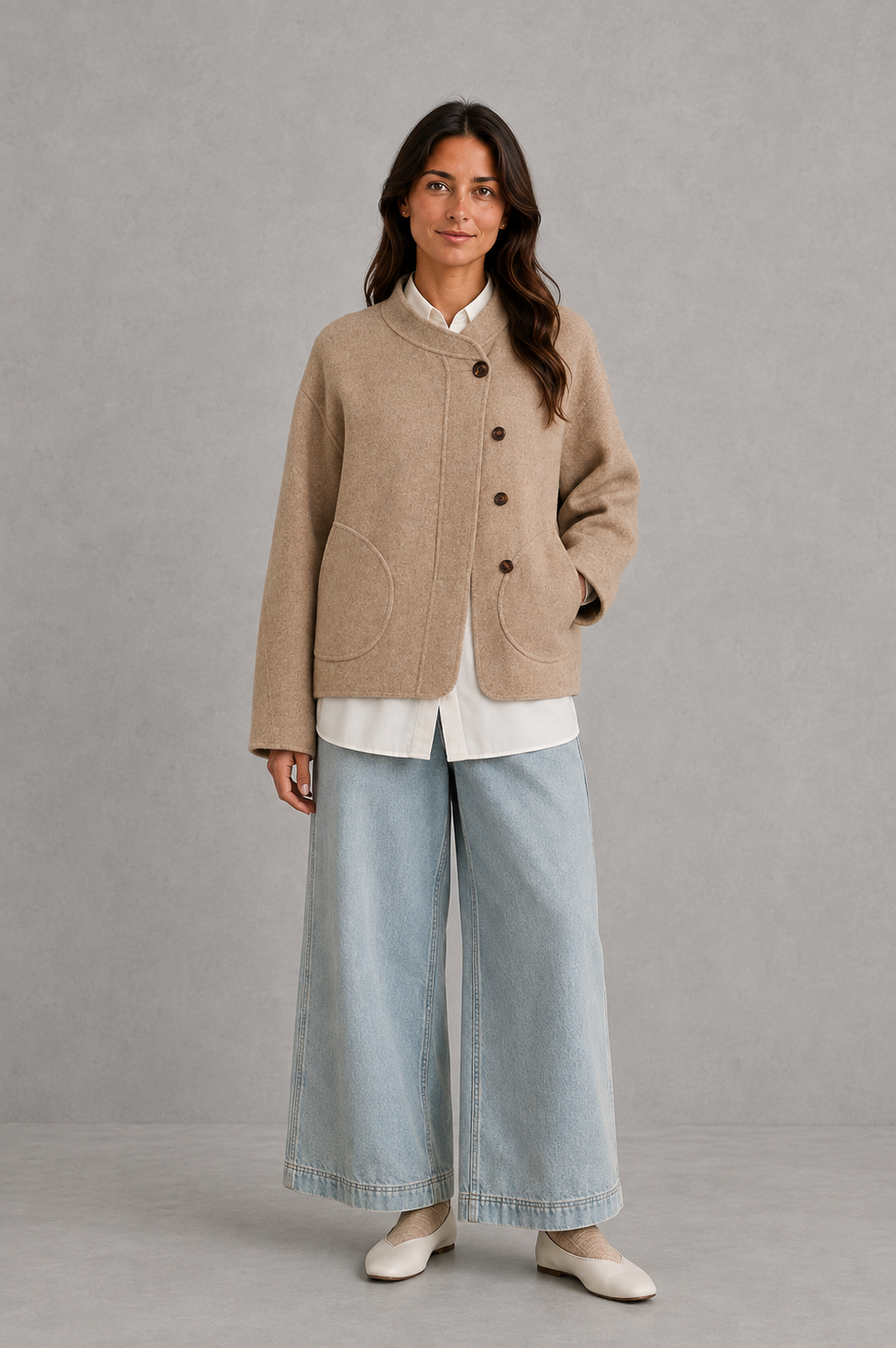 Women’s oversized wool blend coat with a relaxed longline silhouette, soft warm finish and generous fit for comfortable winter layering.