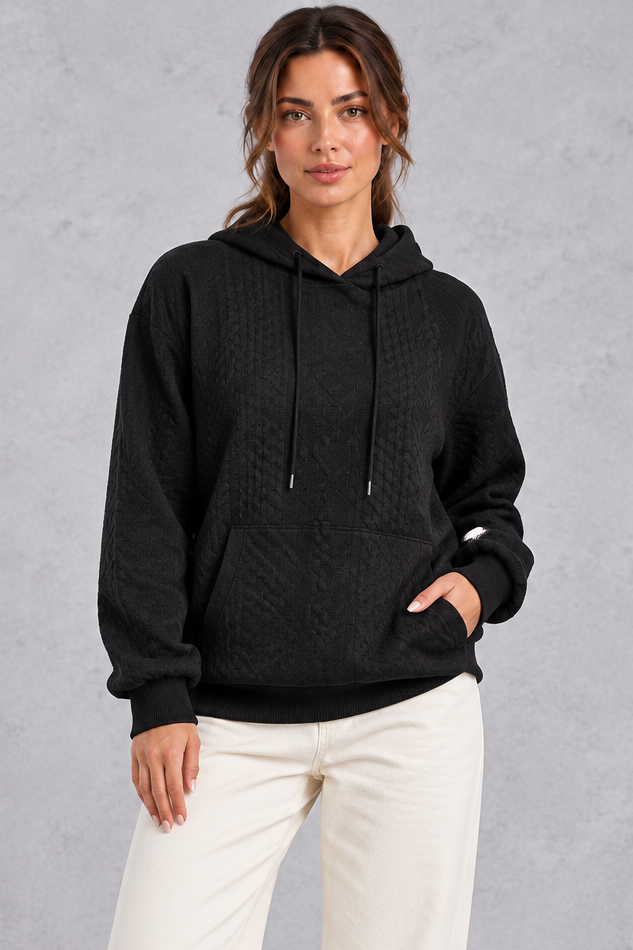 Women's black plus size cable knit hoodie with drawstring hood and front pouch pocket – front view