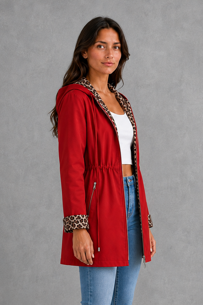Women’s reversible hooded jacket with a solid colour side, leopard print reverse, zip fastening, practical pockets and adjustable drawstring.