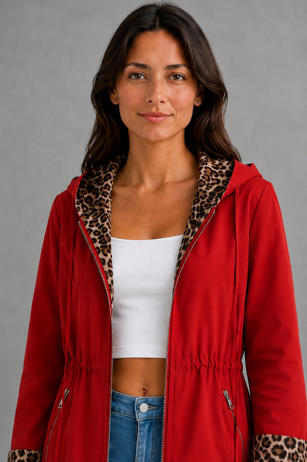 Women’s reversible hooded jacket with a solid colour side, leopard print reverse, zip fastening, practical pockets and adjustable drawstring.