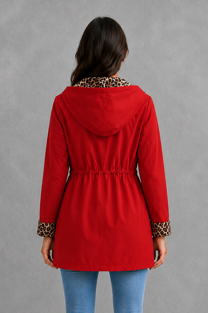 Women’s reversible hooded jacket with a solid colour side, leopard print reverse, zip fastening, practical pockets and adjustable drawstring.