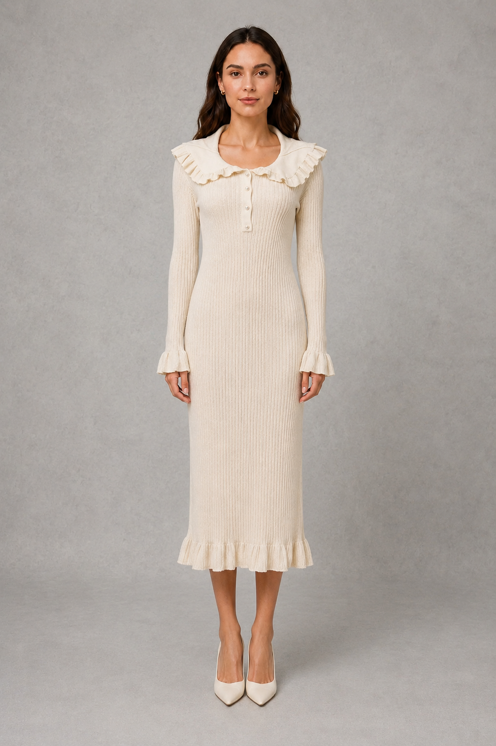 Women’s ribbed knit midi dress with a statement ruffle collar, decorative front buttons, fitted silhouette, long sleeves and flared ruffle cuffs.
