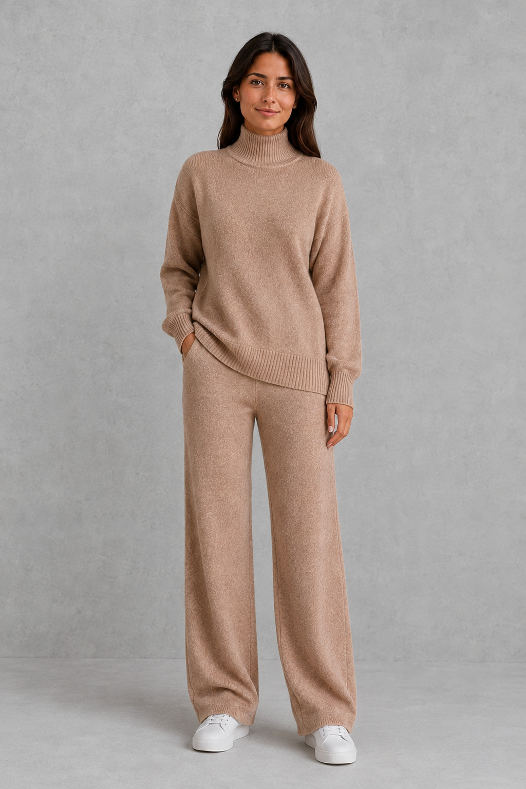 Women’s roll neck knit jumper and wide leg trouser set with an oversized silhouette, dropped shoulders and matching full-length knitted trousers.