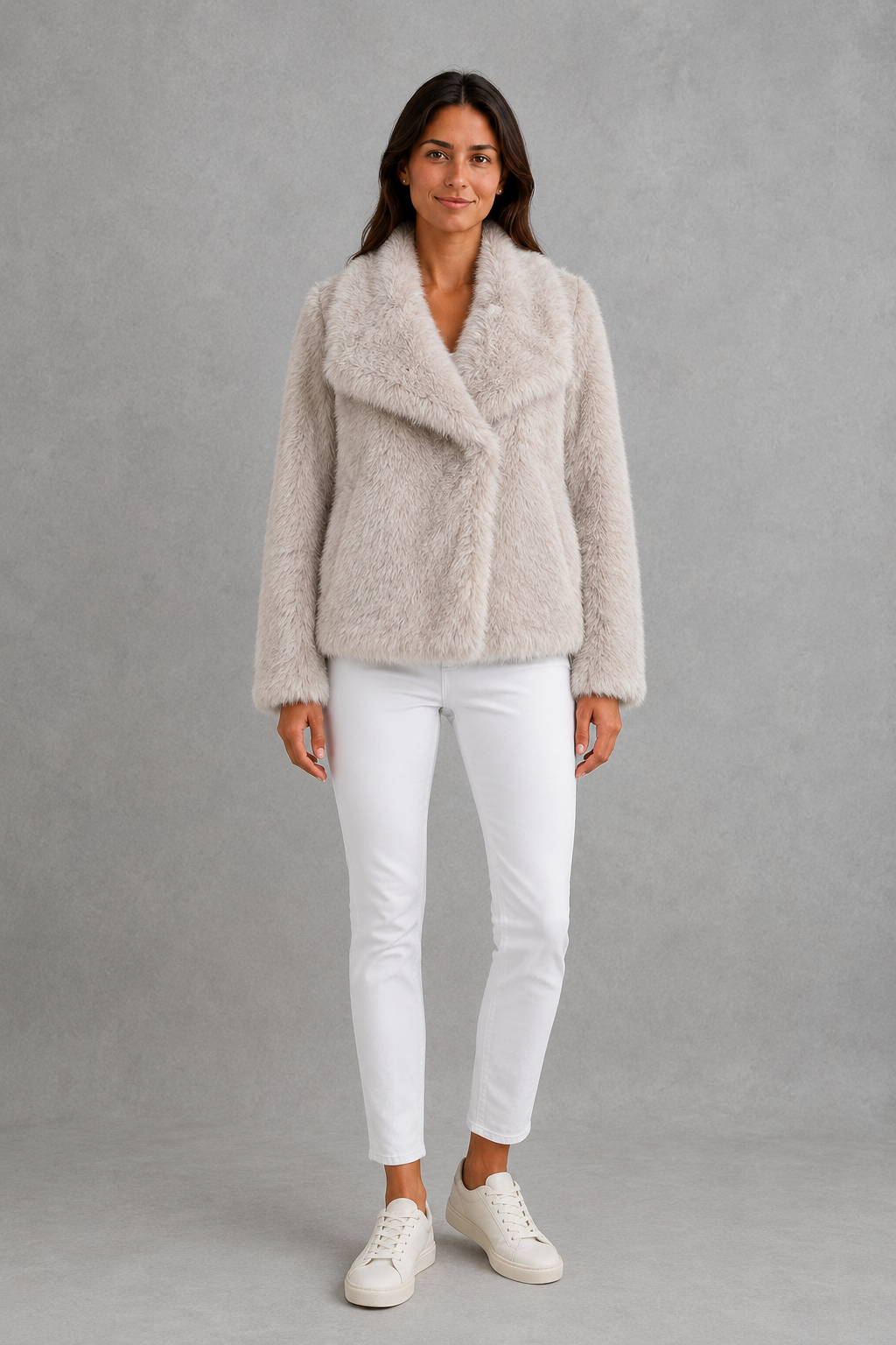 Women’s sleek faux fur jacket with a soft plush texture and elegant winter silhouette.