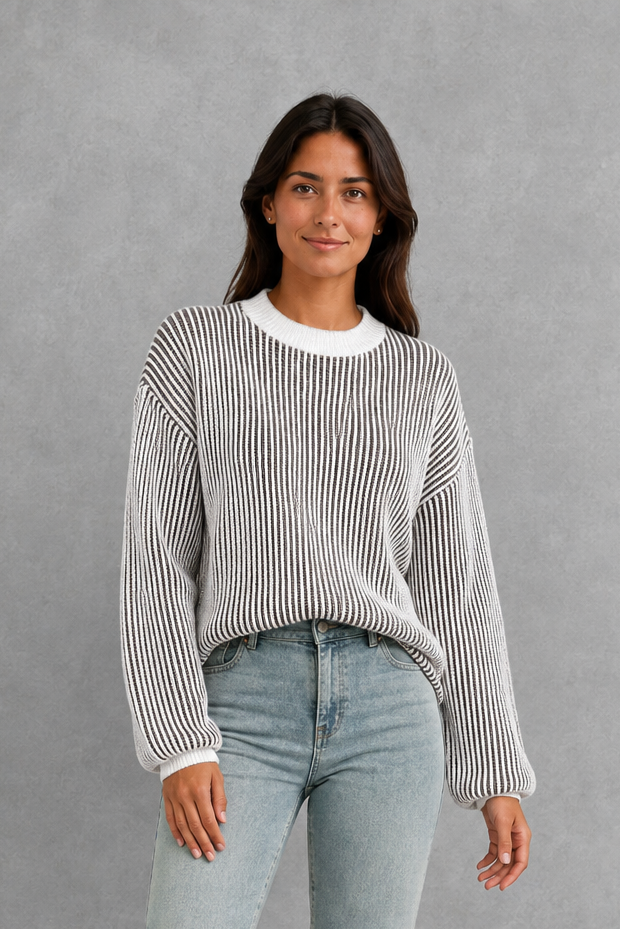 Women’s striped knit jumper with a relaxed fit, drop shoulders, crew neckline and long sleeves.