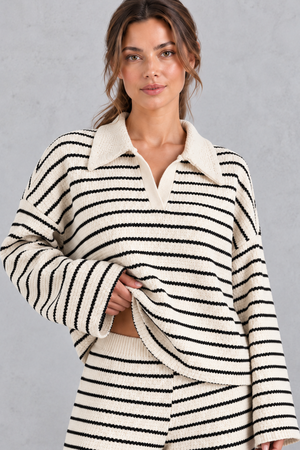 Women's beige striped knit co-ord set – close-up of collared V-neck top and dropped shoulders