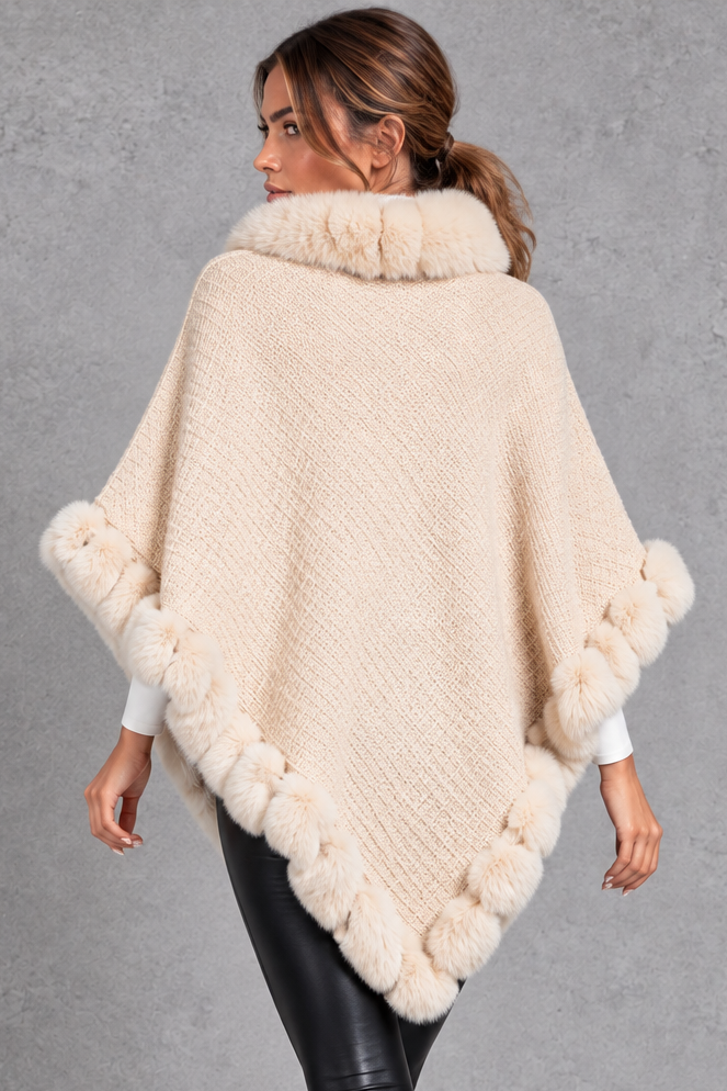 Women's textured knitted poncho in Cream – back view