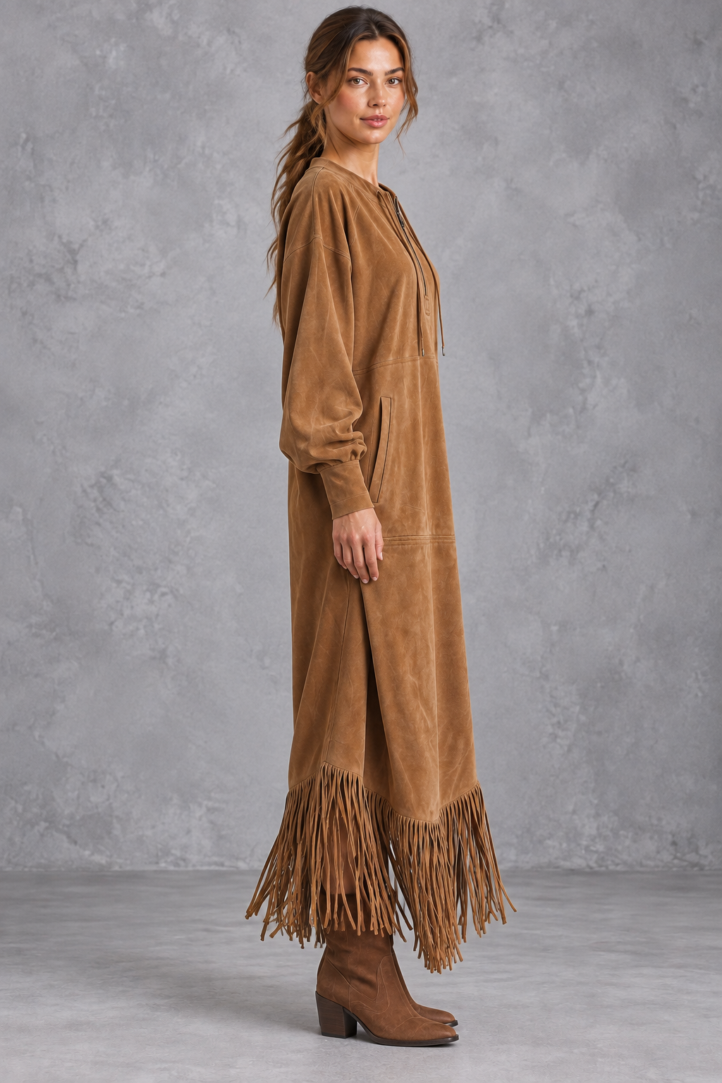 Women’s Western faux suede midi dress with a round neckline, decorative tassel detailing and a relaxed A-line silhouette.