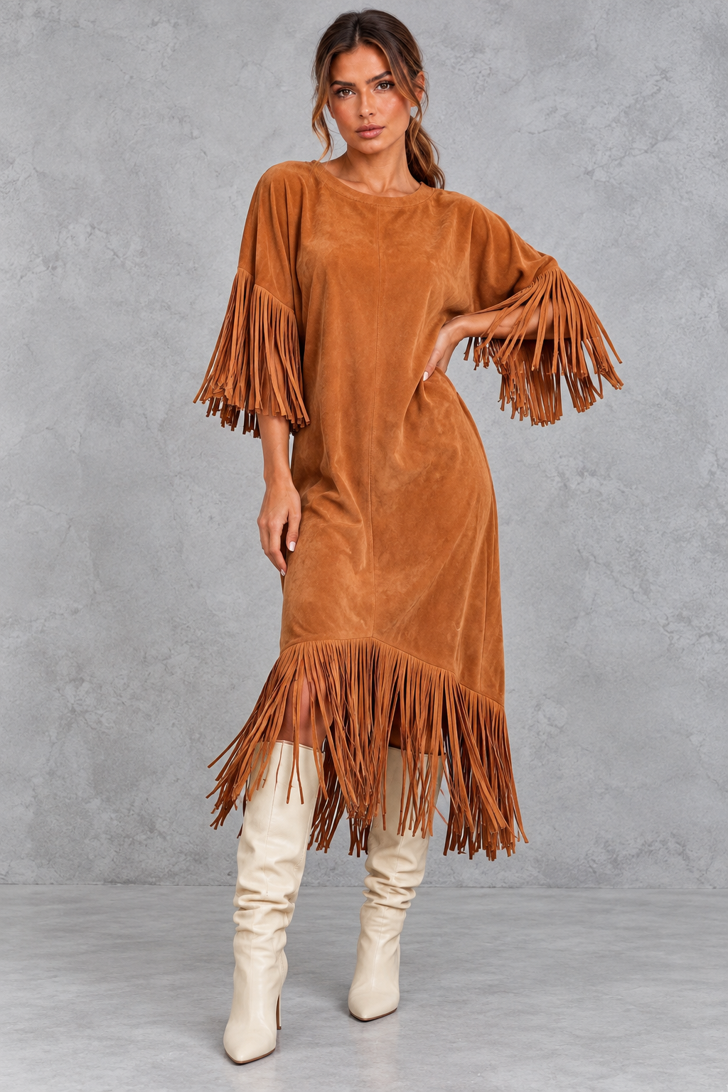 Women’s Western faux suede midi dress with a round neckline, decorative tassel detailing and a relaxed A-line silhouette.