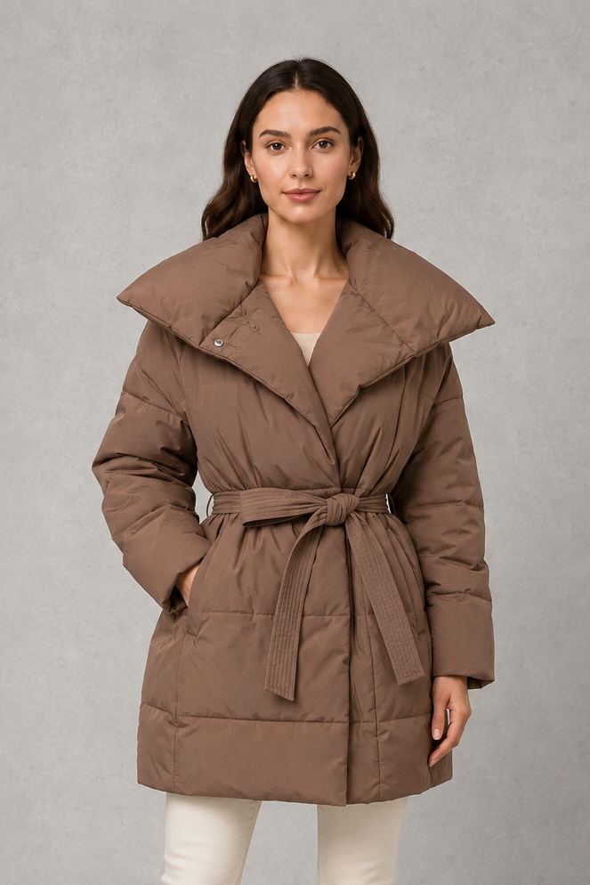 Women’s belted puffer jacket with a quilted design, adjustable waist belt, long sleeves and full front zip fastening.