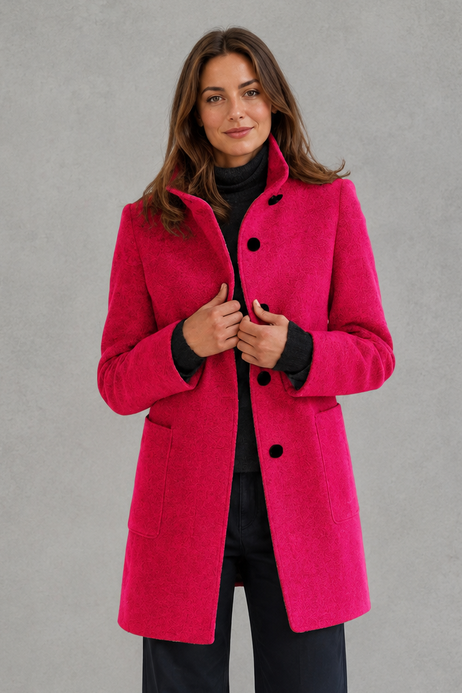 Women's classic longline winter coat with a tailored straight fit, button-front fastening, side pockets and elegant lapel collar, designed for warm, timeless autumn and winter styling.