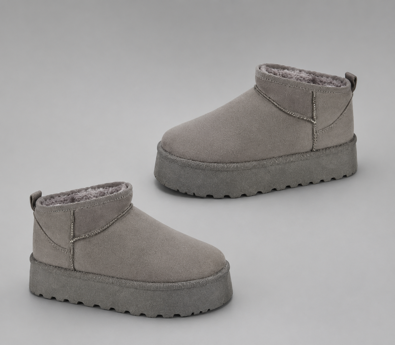 Women's faux suede platform snow boots with a soft faux fur lining, slip-on ankle-height design, round toe, back pull tab, 1.75-inch platform sole and non-slip outsole for warm, comfortable winter everyday wear.