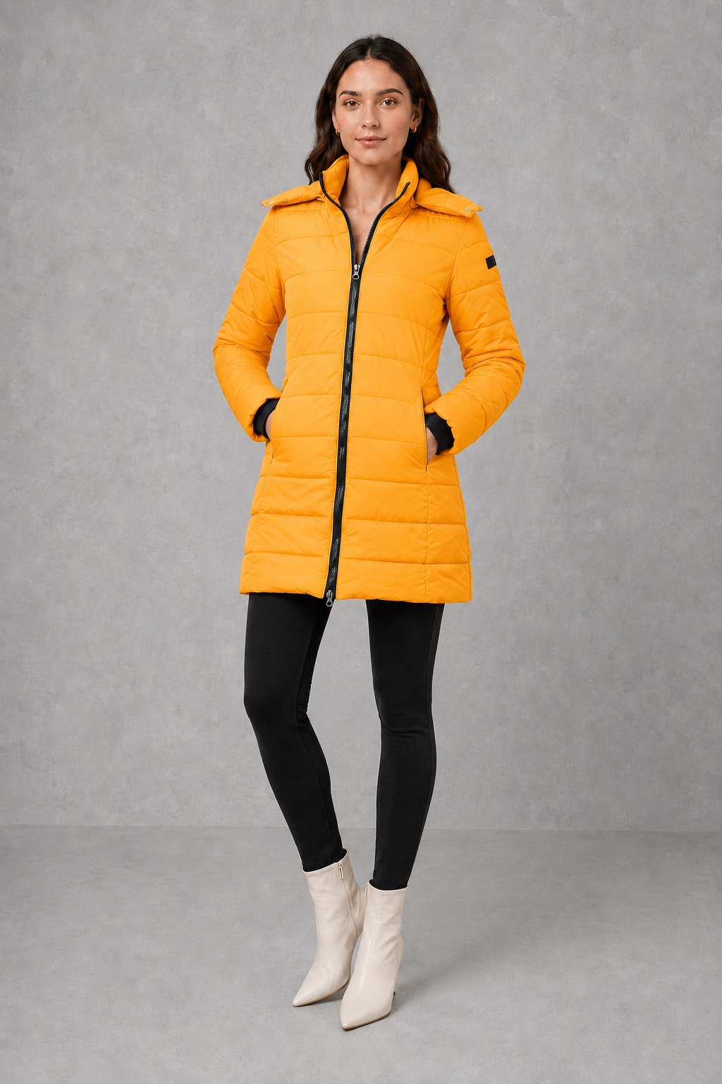 Women’s lightweight insulated hooded coat with padded design, full zip fastening and streamlined fit for autumn and winter.