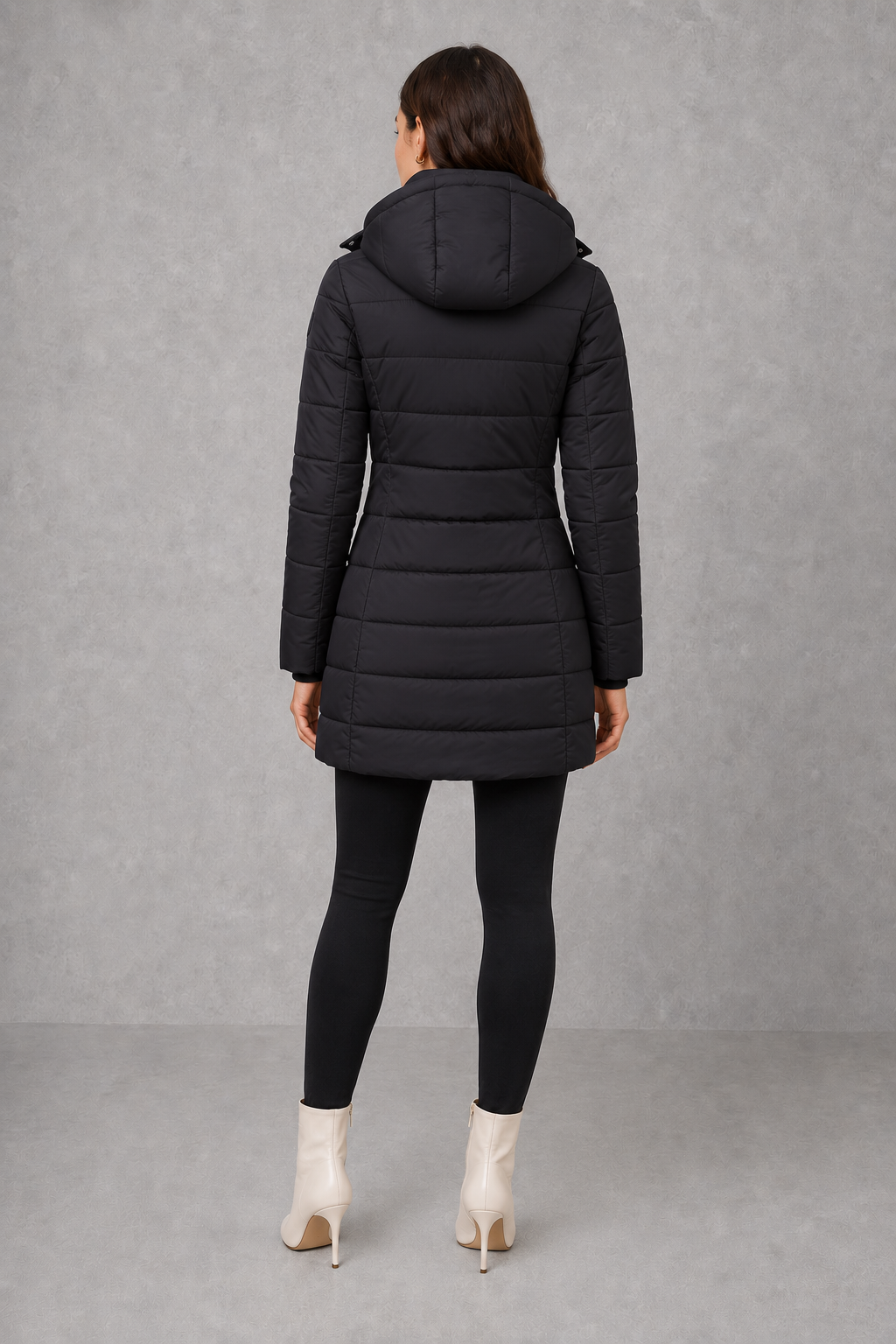 Women’s lightweight insulated hooded coat with padded design, full zip fastening and streamlined fit for autumn and winter.