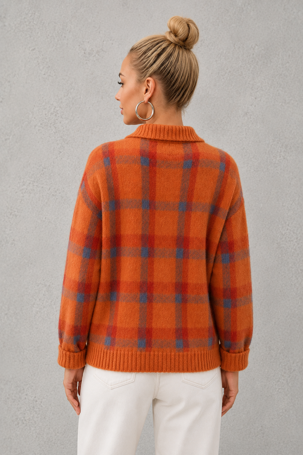Women's plaid knit sweater with a classic check pattern, relaxed fit and soft knitted texture, offering lightweight warmth for casual everyday wear, layering and seasonal styling.