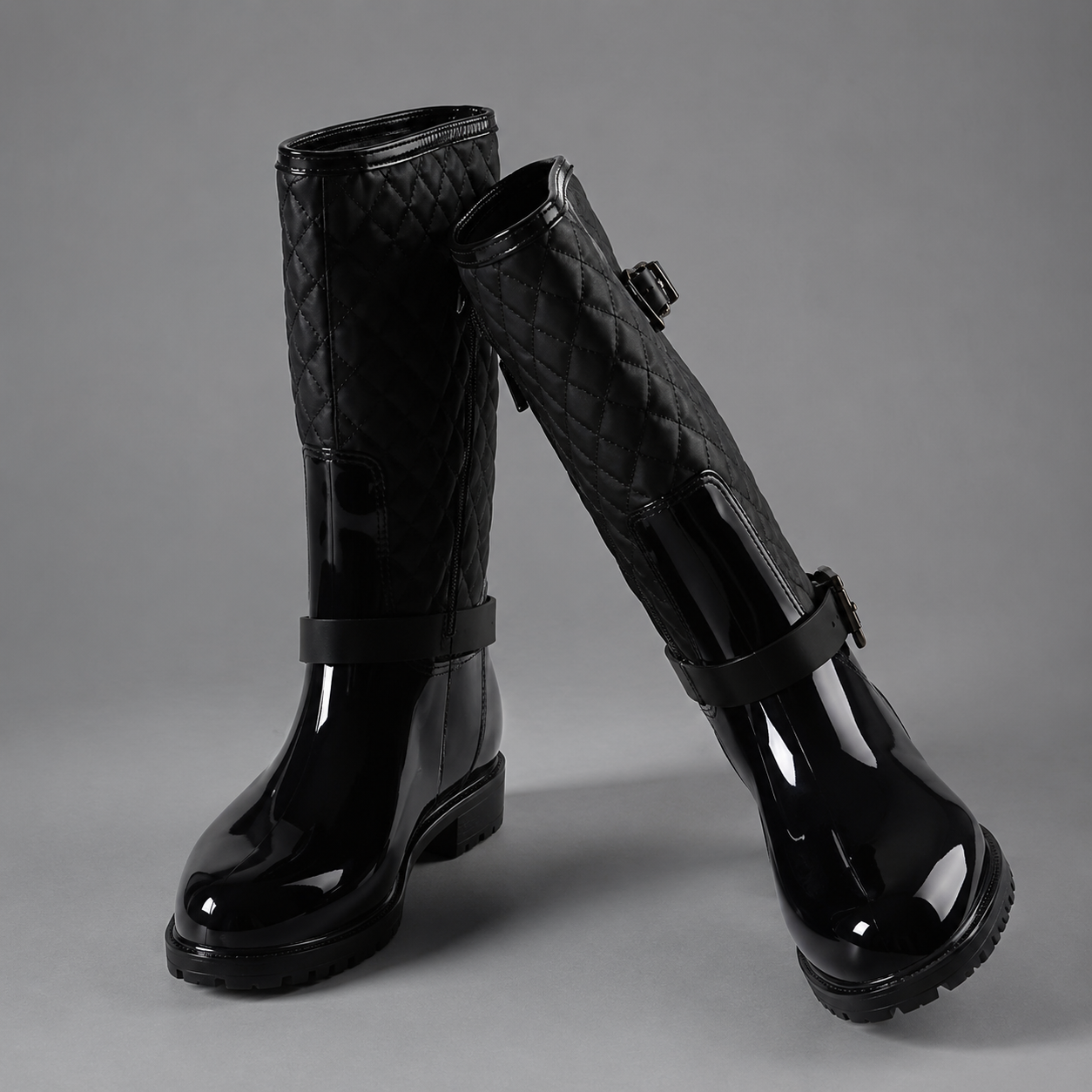 Women's quilted plaid mid-calf rain boots with a waterproof PVC upper, decorative side buckle, round toe and non-slip rubber sole, designed as comfortable slip-on Wellington boots for rainy days, gardening and outdoor wear.