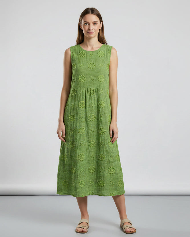 Green dress with floral patterns on a white background1