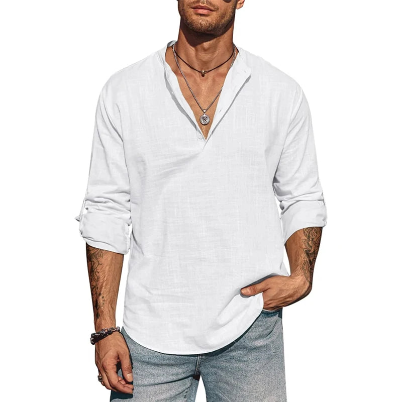 Man wearing a white shirt and gray pants on a white background
