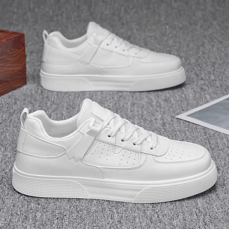 White sneakers on a gray surface