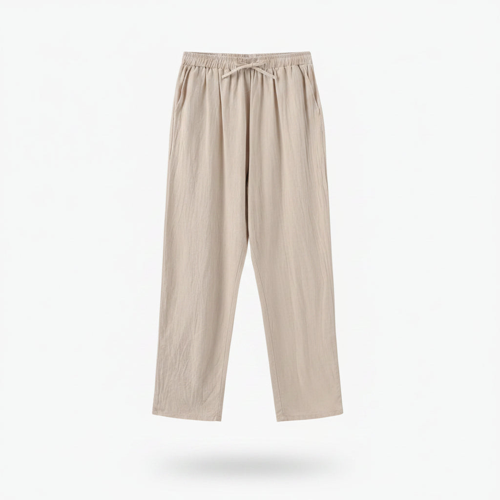 Beige pants on a hanger against a white background