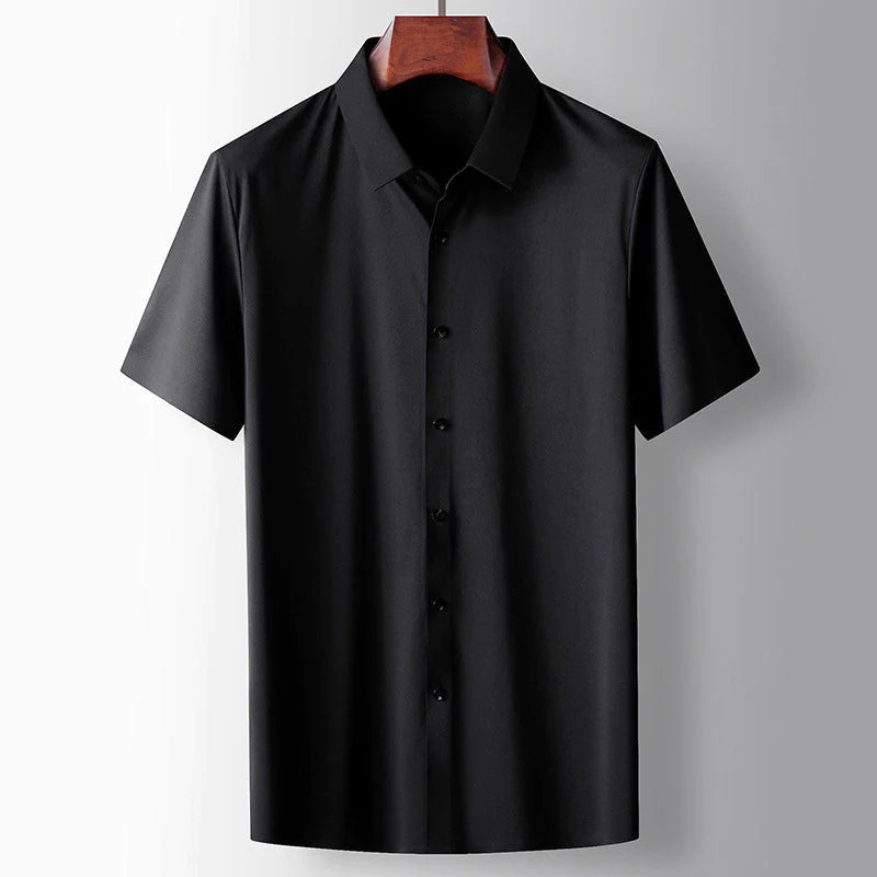 Black short-sleeve shirt on a hanger against a gray background