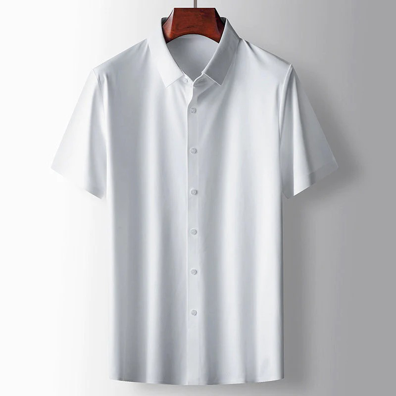 White short-sleeve shirt on a wooden hanger against a gray background